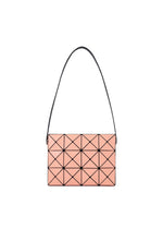 A product shot of the BAO BAO ISSEY MIYAKE CUBOID shoulder bag in coral orange.
