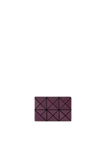 A product shot of the BAO BAO ISSEY MIYAKE TWINKLE wallet in burgundy.