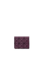 A product shot of the BAO BAO ISSEY MIYAKE TWINKLE wallet in burgundy.