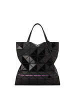 A detail shot of the BAO BAO ISSEY MIYAKE WARP tote.