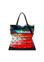 A product shot of the BAO BAO ISSEY MIYAKE WARP tote in red mix.