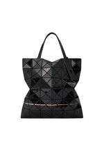 A detail shot of the BAO BAO ISSEY MIYAKE WARP tote.