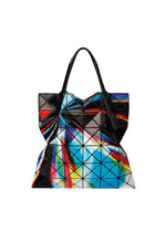 A product shot of the BAO BAO ISSEY MIYAKE WARP tote in blue mix.