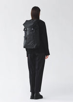 A model wears the BAO BAO ISSEY MIYAKE HIKER hiker-backpack-matte-black-3.