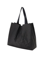 A detail shot of the BAO BAO ISSEY MIYAKE CART tote.