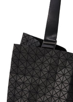 A detail shot of the BAO BAO ISSEY MIYAKE CART tote.