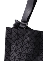A detail shot of the BAO BAO ISSEY MIYAKE CART MINI tote.