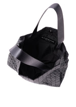 A detail shot of the BAO BAO ISSEY MIYAKE CART MINI tote.