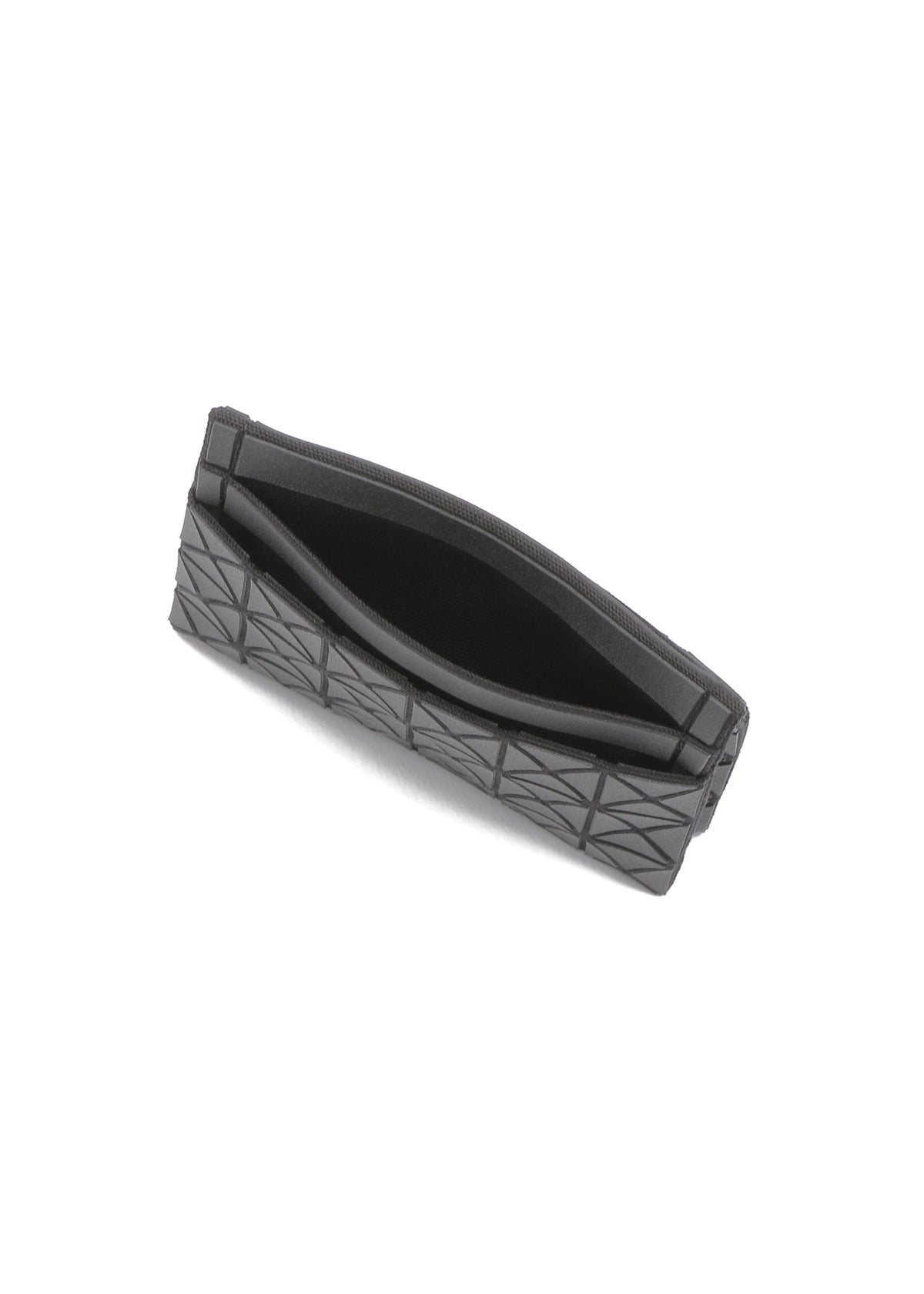 A detail shot of the BAO BAO ISSEY MIYAKE OYSTER accessory.