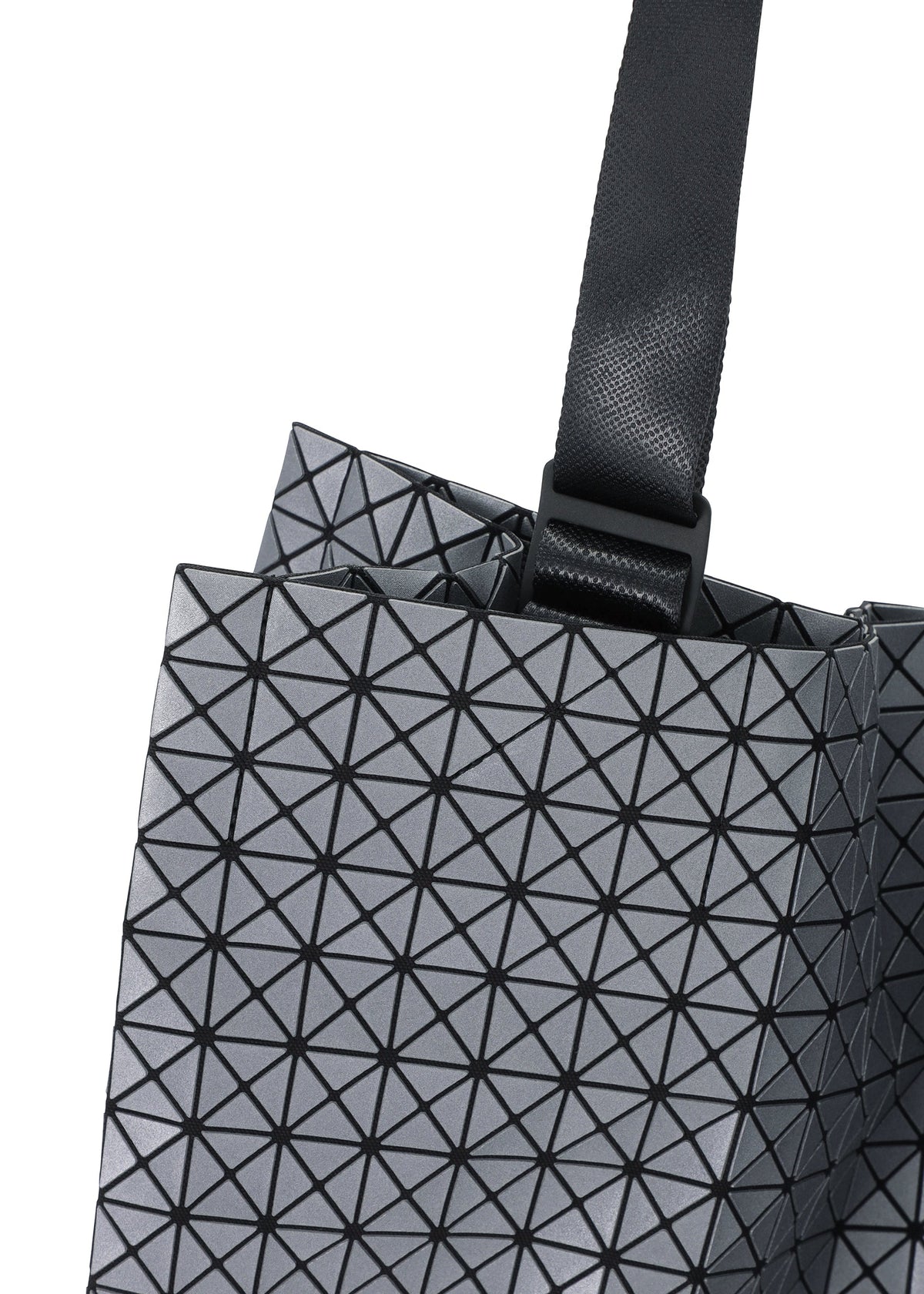 A detail shot of the BAO BAO ISSEY MIYAKE CART REFLECTOR tote.