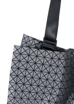 A detail shot of the BAO BAO ISSEY MIYAKE CART REFLECTOR tote.