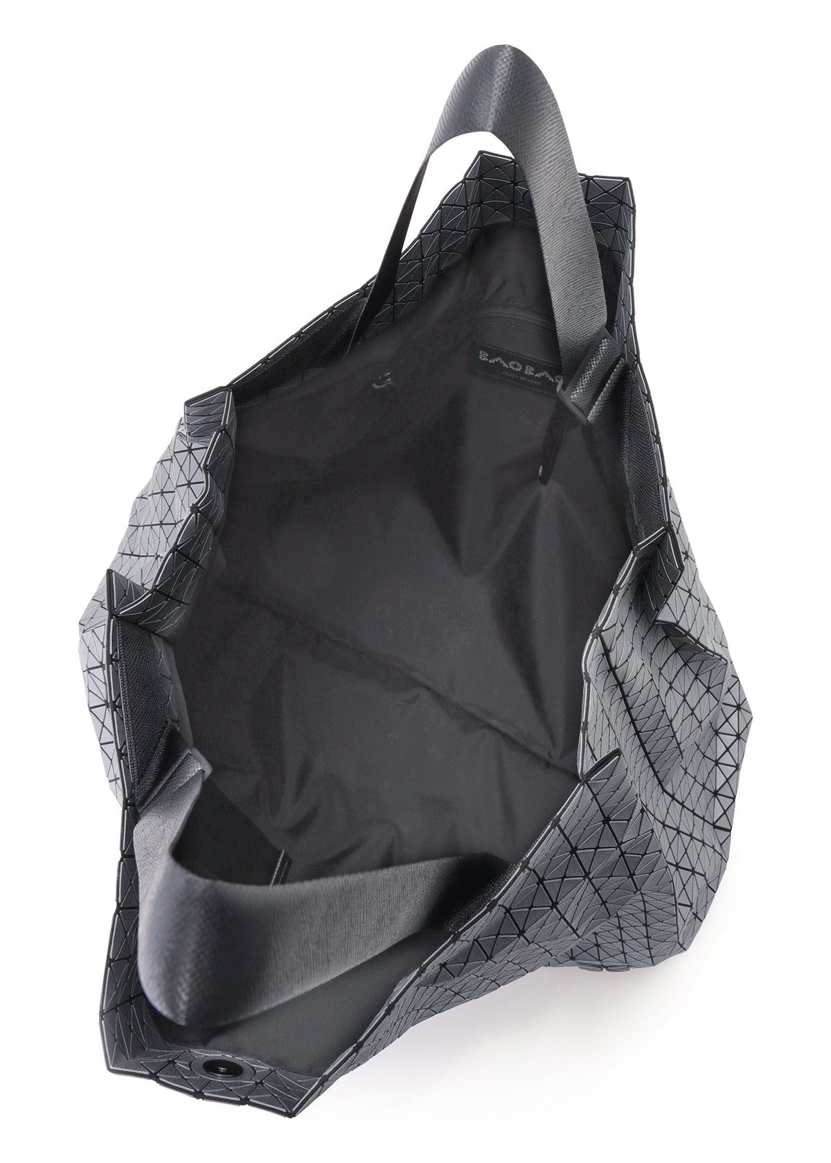 A detail shot of the BAO BAO ISSEY MIYAKE CART REFLECTOR tote.