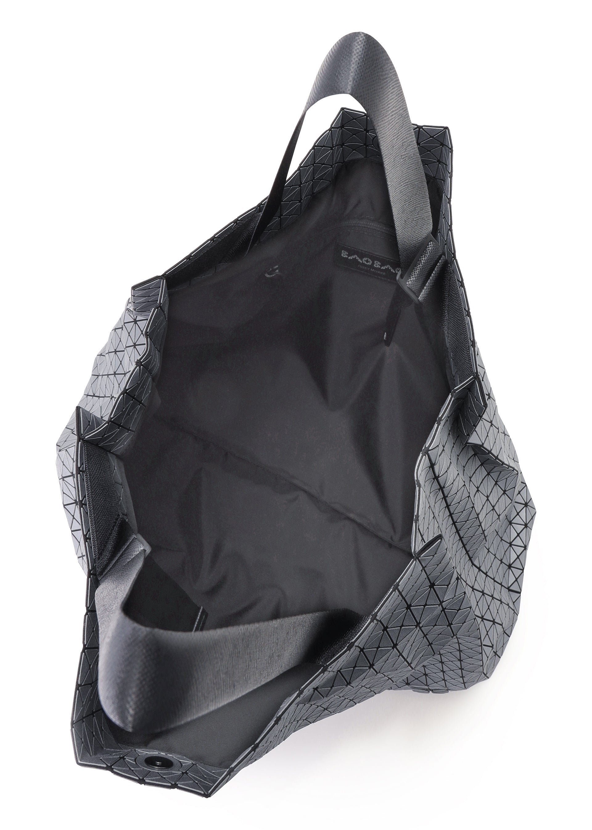 A detail shot of the BAO BAO ISSEY MIYAKE CART REFLECTOR tote.