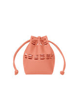 A product shot of the GOOD GOODS ISSEY MIYAKE MOKKO S.C. POCKET 2 bag in flamingo (26).