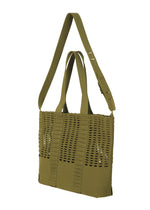 A detail shot of the GOOD GOODS ISSEY MIYAKE MOKKO MONO bag.