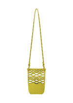 A product shot of the GOOD GOODS ISSEY MIYAKE MOKKO BASKET bag in bamboo green x olive green (68).