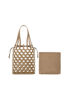 A detail shot of the GOOD GOODS ISSEY MIYAKE AMIME bag.