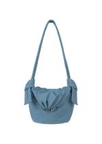 A product shot of the GOOD GOODS ISSEY MIYAKE FUWA FUWA bag in blue (72).