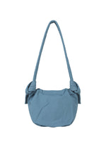 A detail shot of the GOOD GOODS ISSEY MIYAKE FUWA FUWA bag.