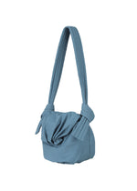 A detail shot of the GOOD GOODS ISSEY MIYAKE FUWA FUWA bag.