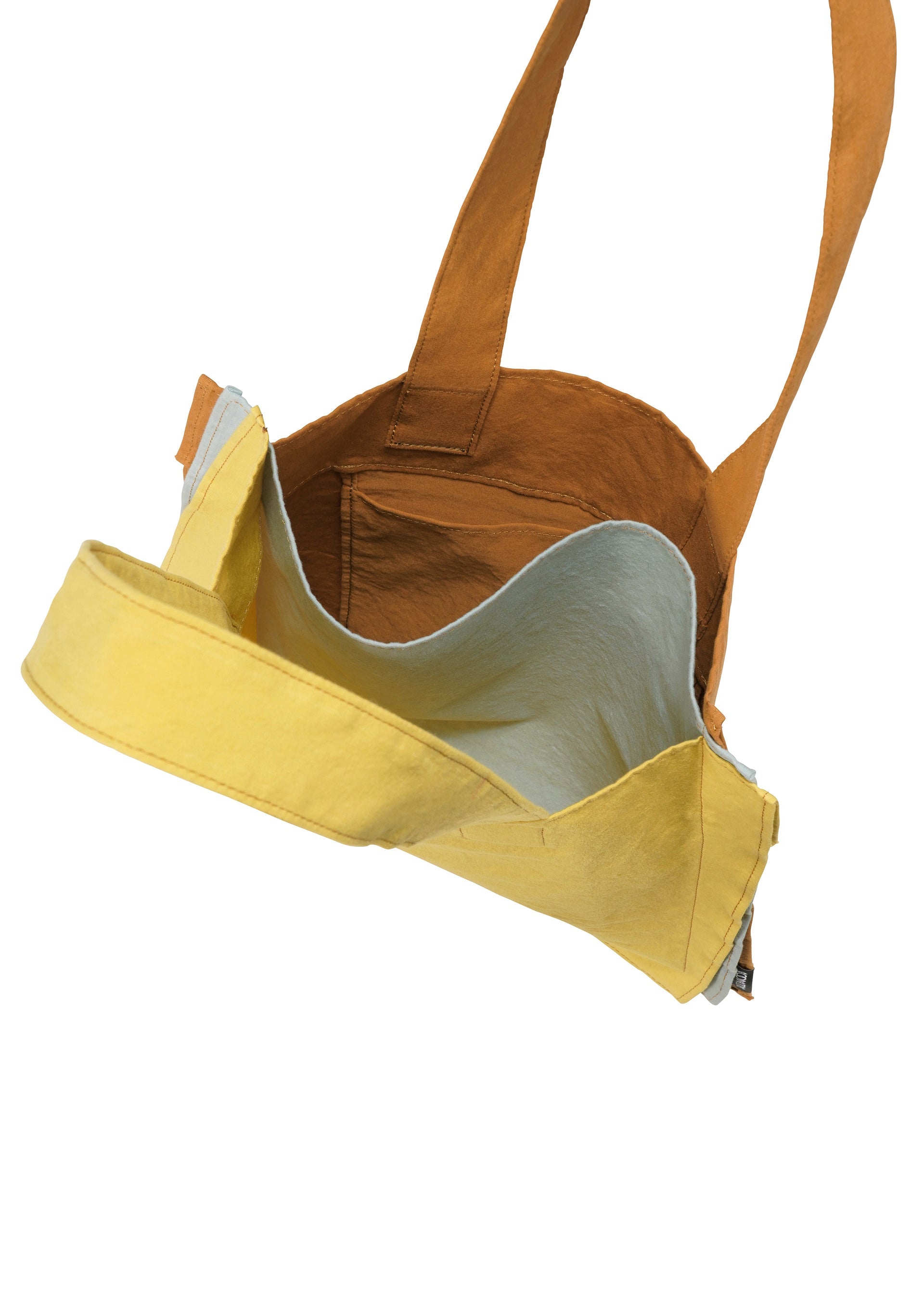 A detail shot of the GOOD GOODS ISSEY MIYAKE IROGAMI bag.