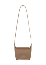 A detail shot of the GOOD GOODS ISSEY MIYAKE BOX bag.