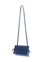 A detail shot of the GOOD GOODS ISSEY MIYAKE MOKKO BI COLOR bag.