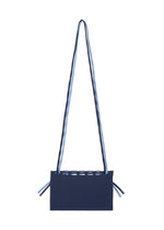 A detail shot of the GOOD GOODS ISSEY MIYAKE MOKKO BI COLOR bag.