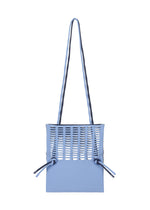A detail shot of the GOOD GOODS ISSEY MIYAKE MOKKO BI COLOR bag.