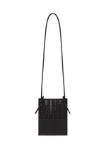 A product shot of the GOOD GOODS ISSEY MIYAKE MOKKO KNAPSACK bag in black.