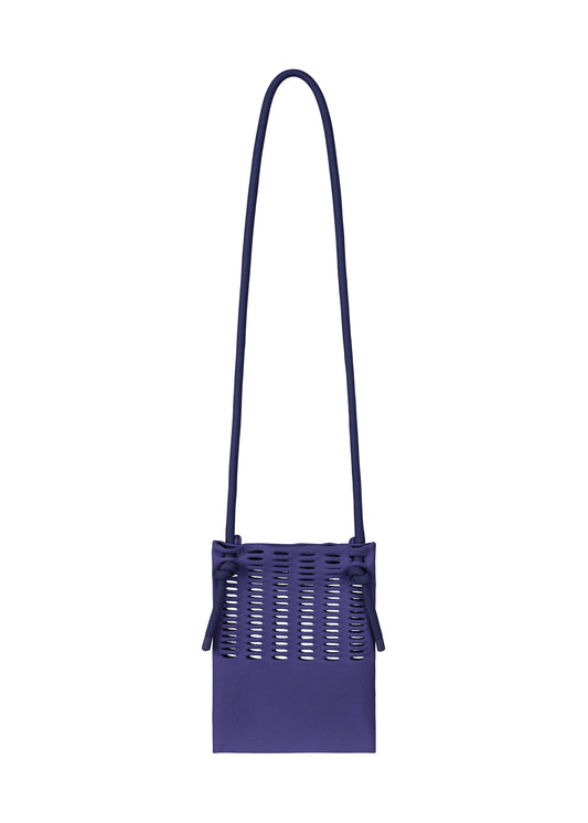 A product shot of the GOOD GOODS ISSEY MIYAKE MOKKO KNAPSACK bag in blue purple.