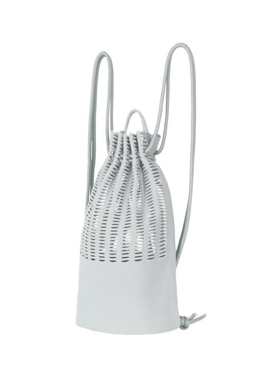 A product shot of the GOOD GOODS ISSEY MIYAKE MOKKO KNAPSACK bag in sky grey.