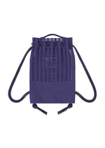 A detail shot of the GOOD GOODS ISSEY MIYAKE MOKKO KNAPSACK bag.