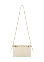 A detail shot of the GOOD GOODS ISSEY MIYAKE MOKKO TWILL bag.