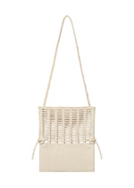 A detail shot of the GOOD GOODS ISSEY MIYAKE MOKKO TWILL bag.
