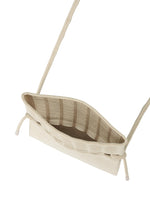 A detail shot of the GOOD GOODS ISSEY MIYAKE MOKKO TWILL bag.