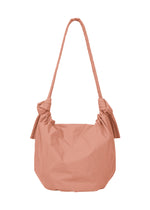 A detail shot of the GOOD GOODS ISSEY MIYAKE FUWA FUWA bags.