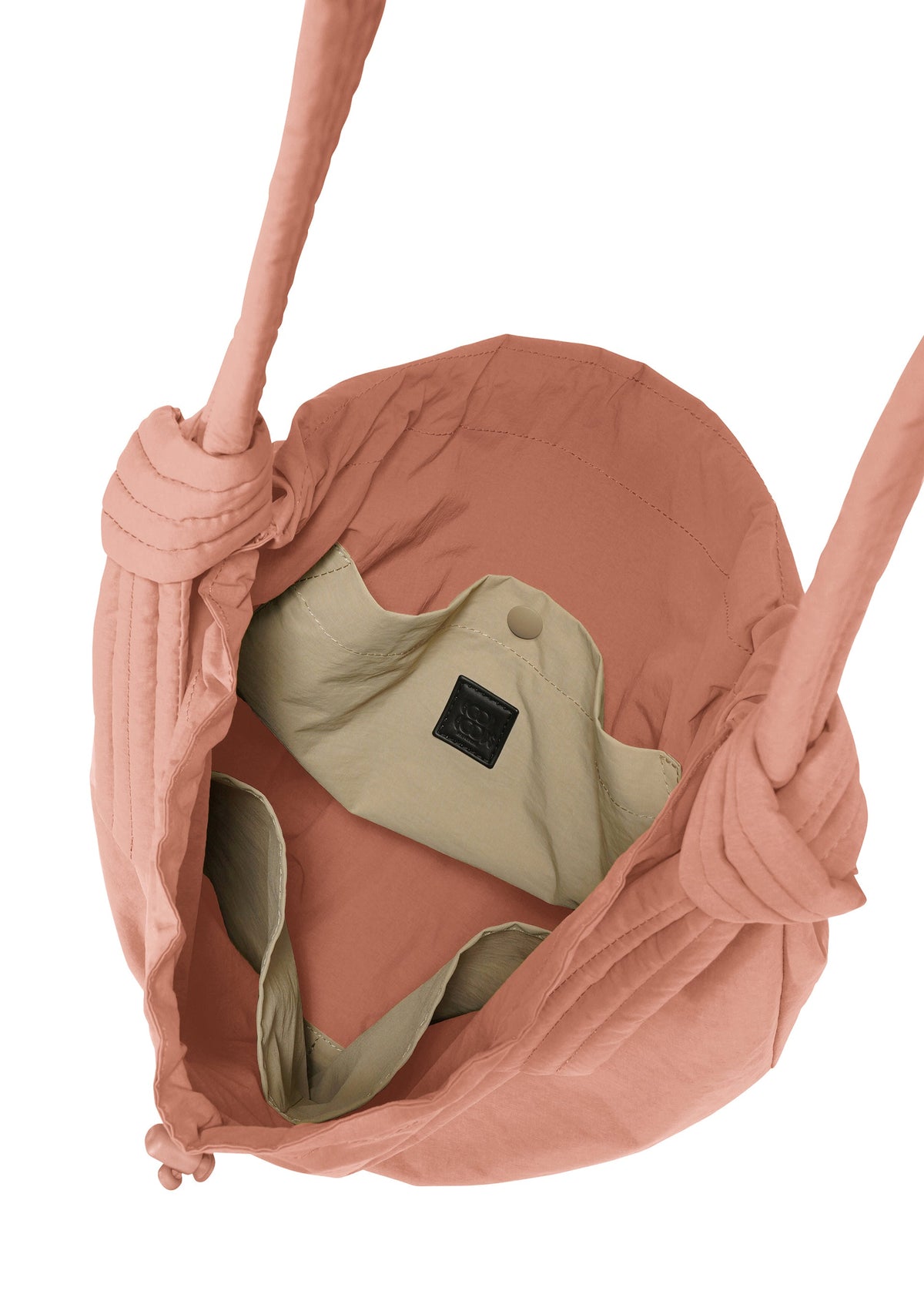 A detail shot of the GOOD GOODS ISSEY MIYAKE FUWA FUWA bags.