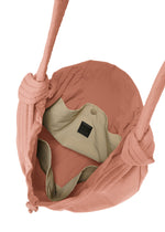 A detail shot of the GOOD GOODS ISSEY MIYAKE FUWA FUWA bags.