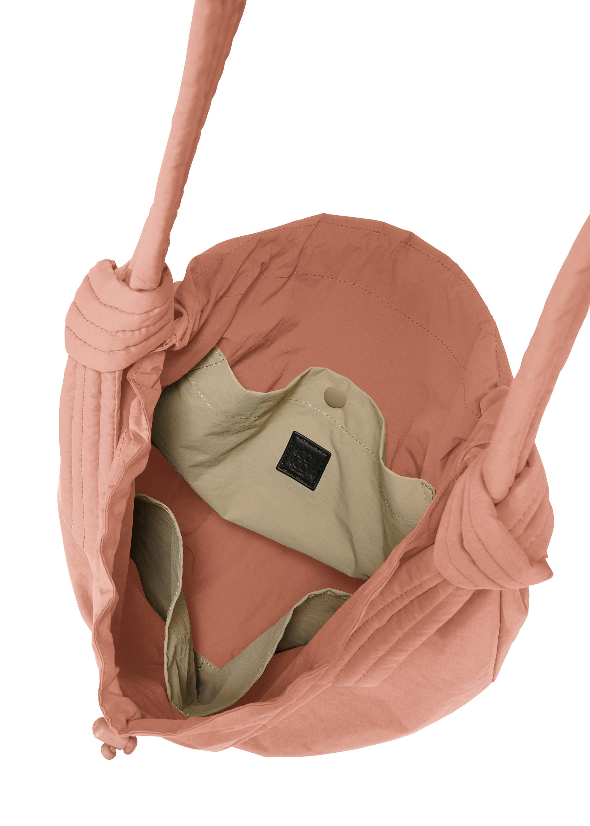 A detail shot of the GOOD GOODS ISSEY MIYAKE FUWA FUWA bags.