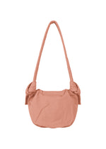 A detail shot of the GOOD GOODS ISSEY MIYAKE FUWA FUWA bags.