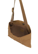 A detail shot of the GOOD GOODS ISSEY MIYAKE GRID bag.