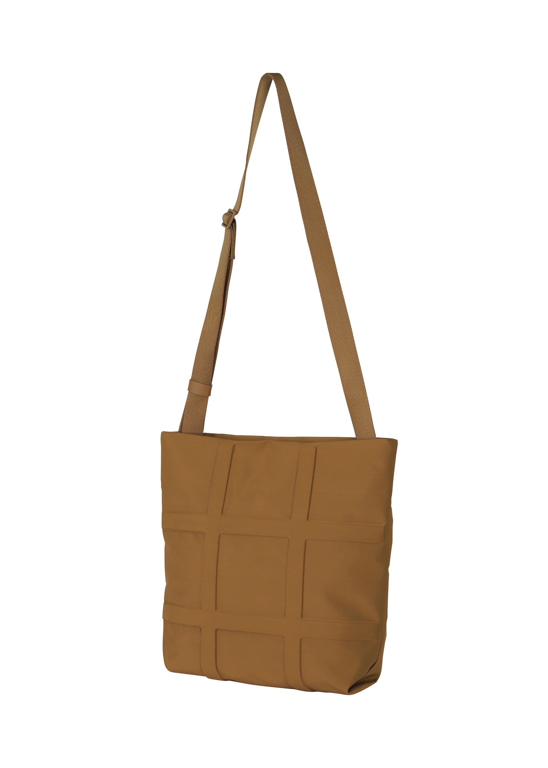 A detail shot of the GOOD GOODS ISSEY MIYAKE GRID bag.