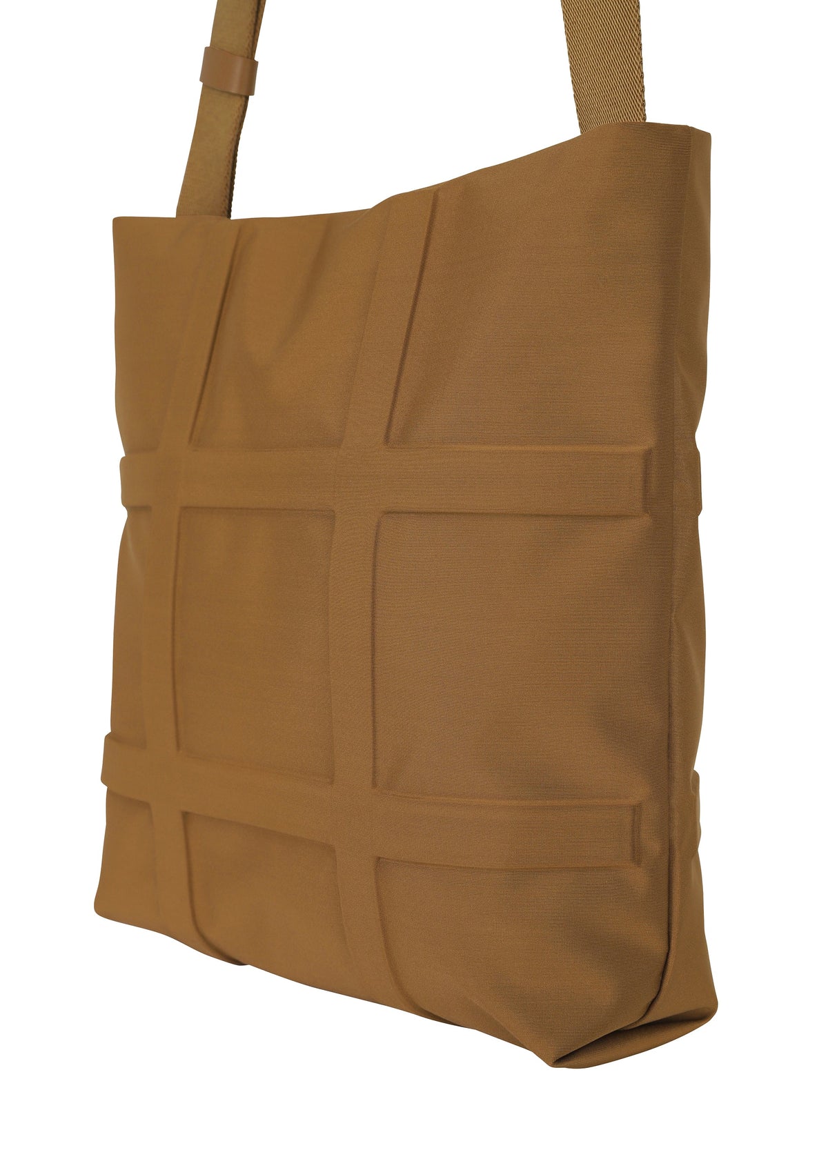 A detail shot of the GOOD GOODS ISSEY MIYAKE GRID bag.