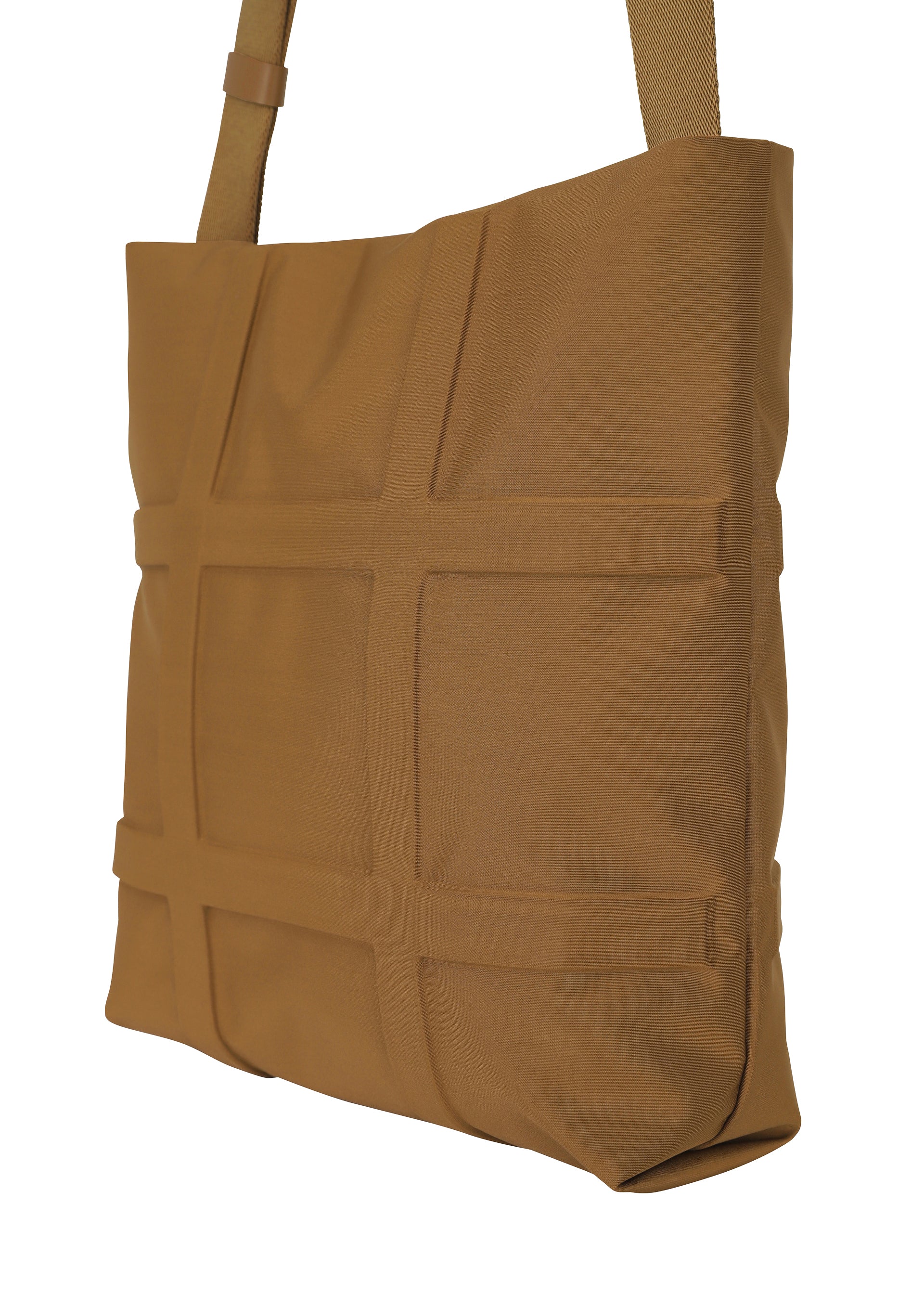 A detail shot of the GOOD GOODS ISSEY MIYAKE GRID bag.