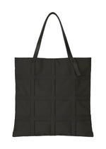 A product shot of the GOOD GOODS ISSEY MIYAKE GRID bag in black (15).