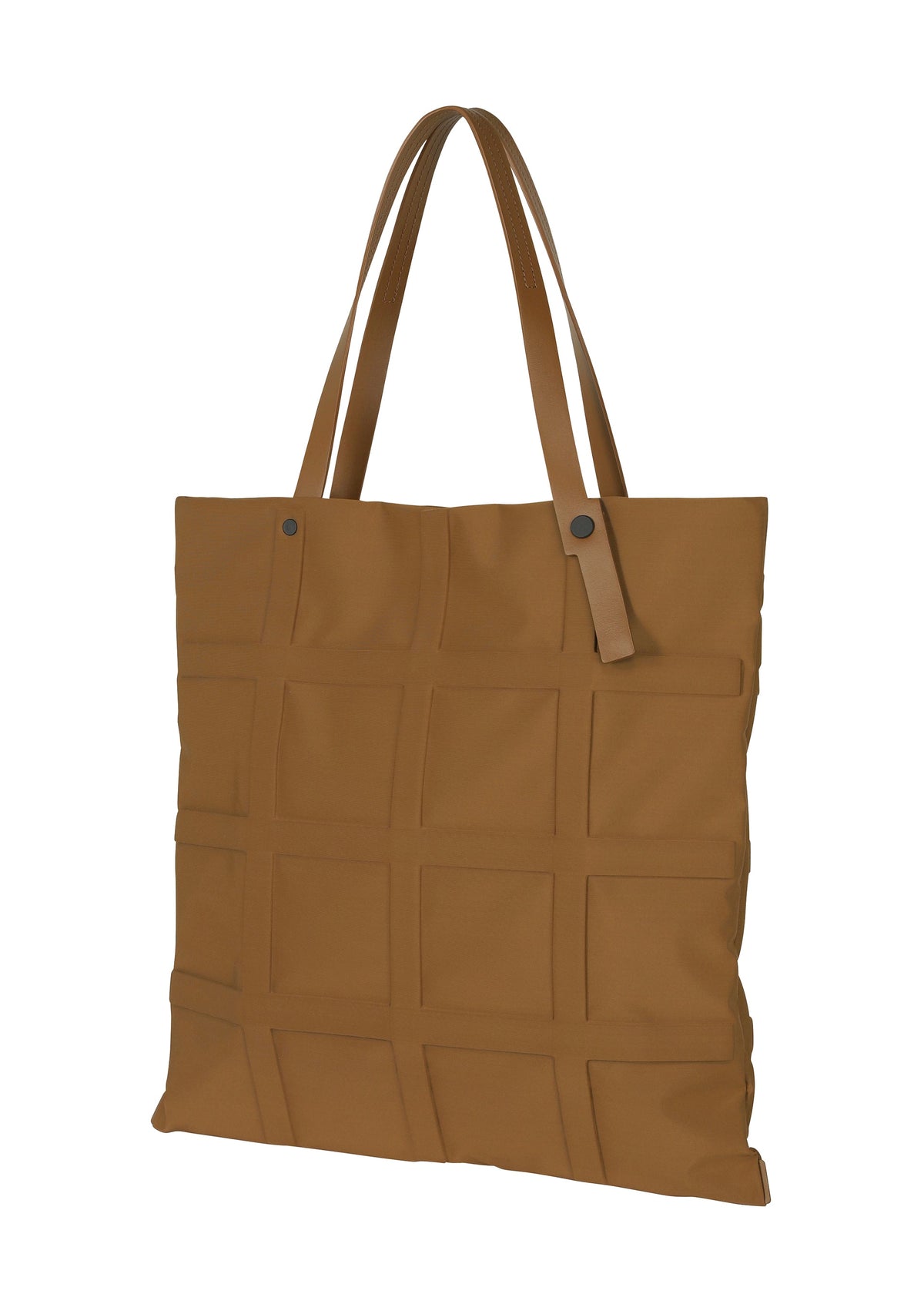 A detail shot of the GOOD GOODS ISSEY MIYAKE GRID bag.