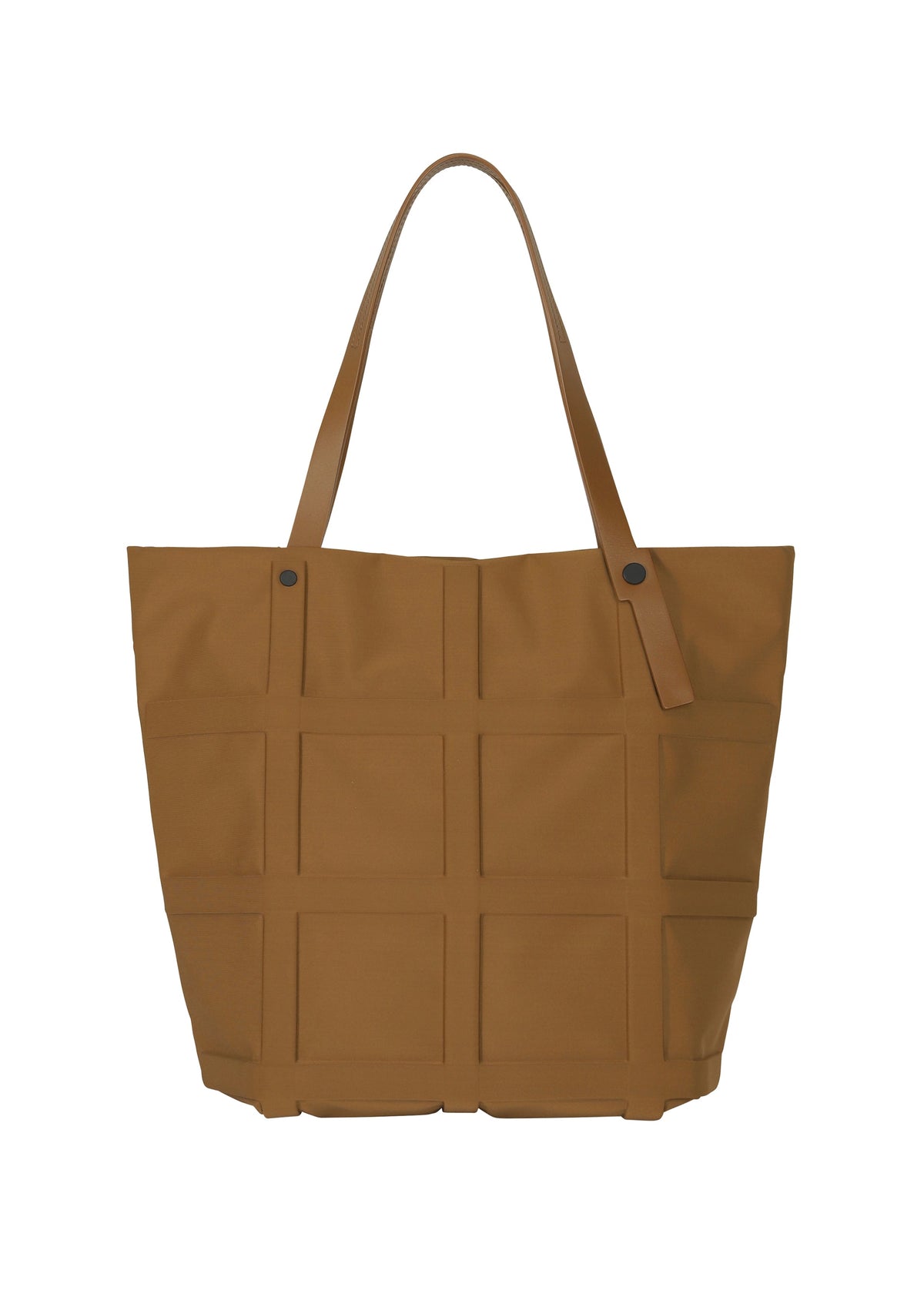 A detail shot of the GOOD GOODS ISSEY MIYAKE GRID bag.