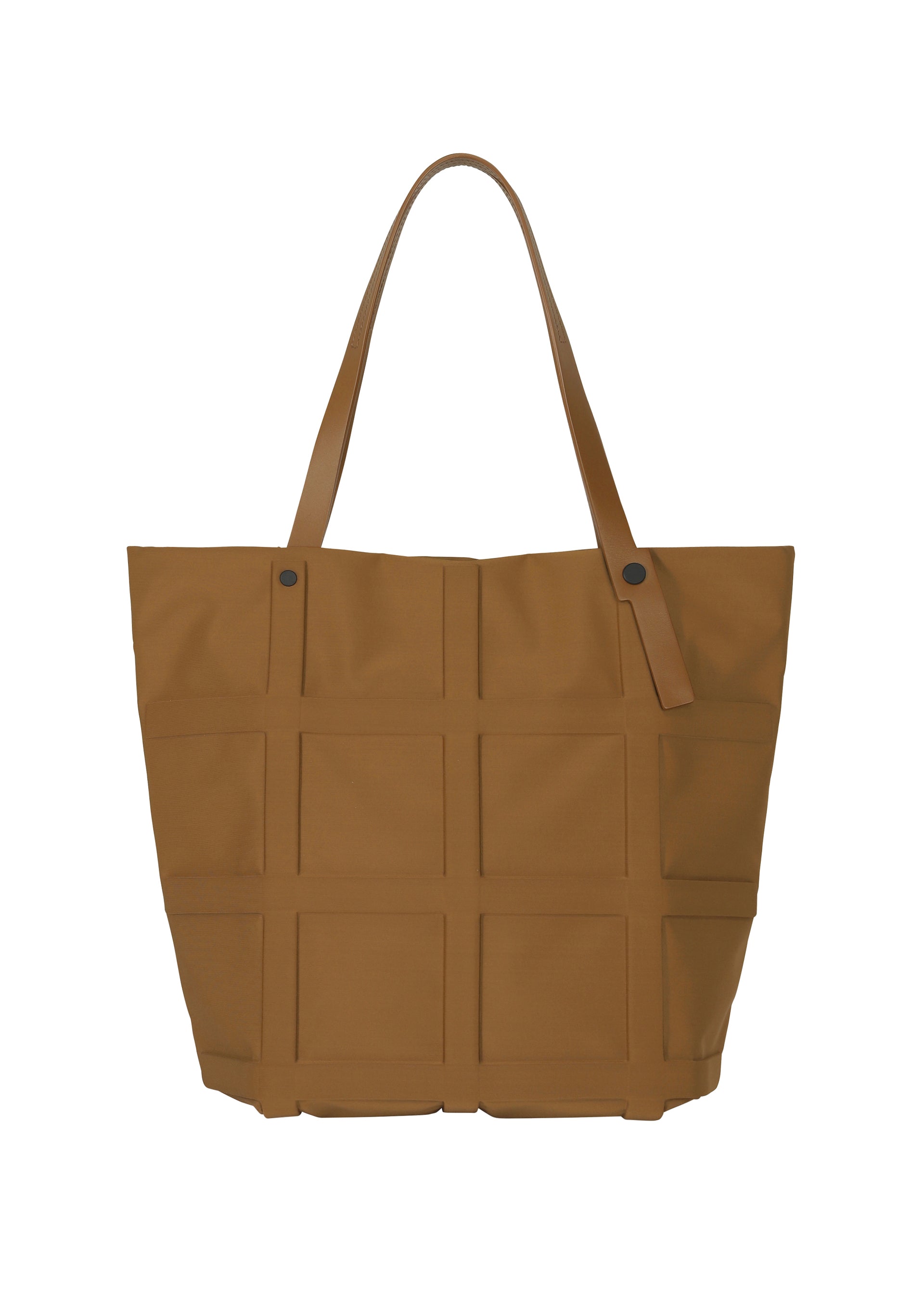 A detail shot of the GOOD GOODS ISSEY MIYAKE GRID bag.