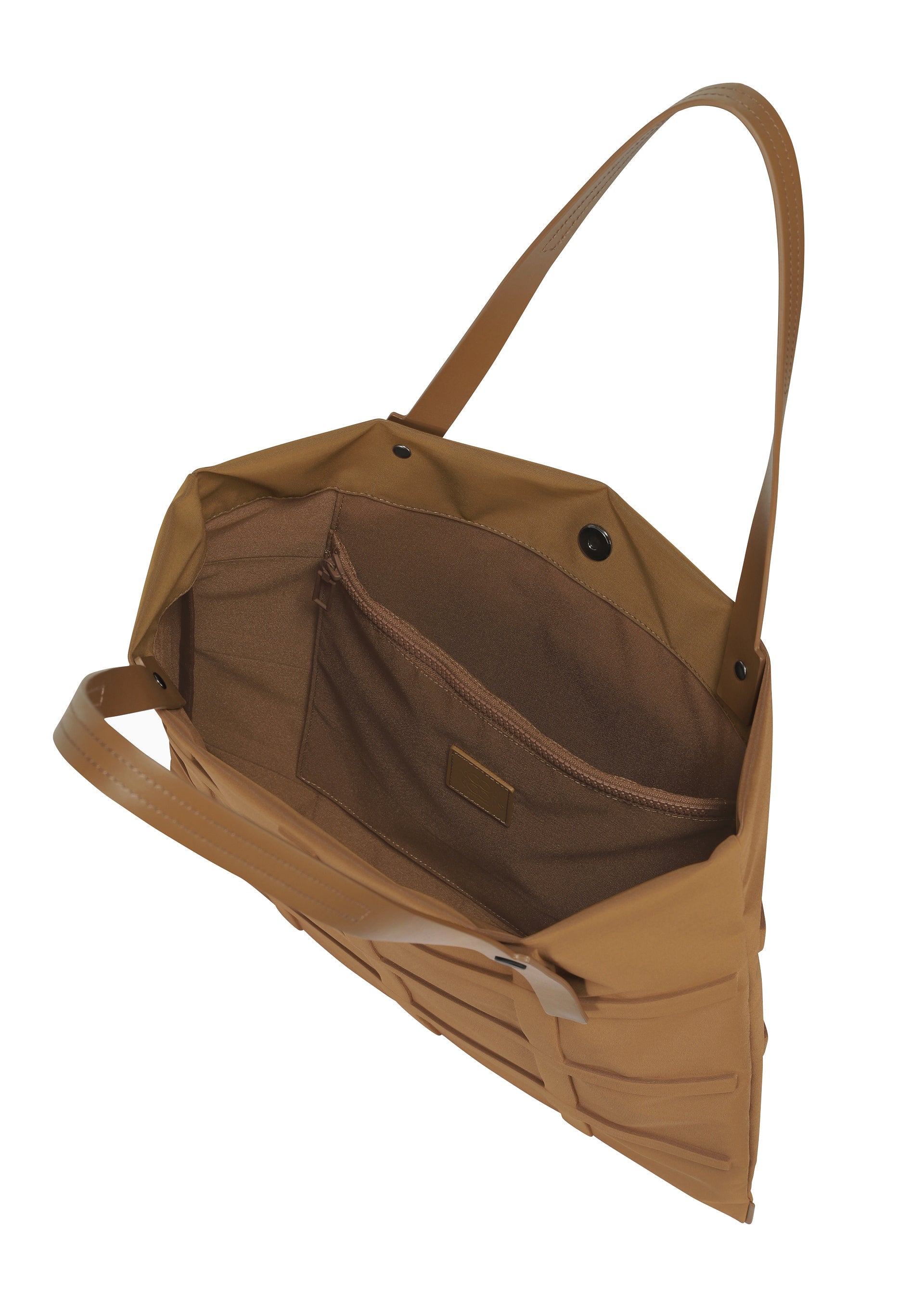 A detail shot of the GOOD GOODS ISSEY MIYAKE GRID bag.